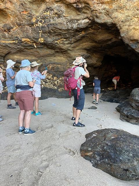 Entrance to cave with Kelp Flies swarming as boys entered.