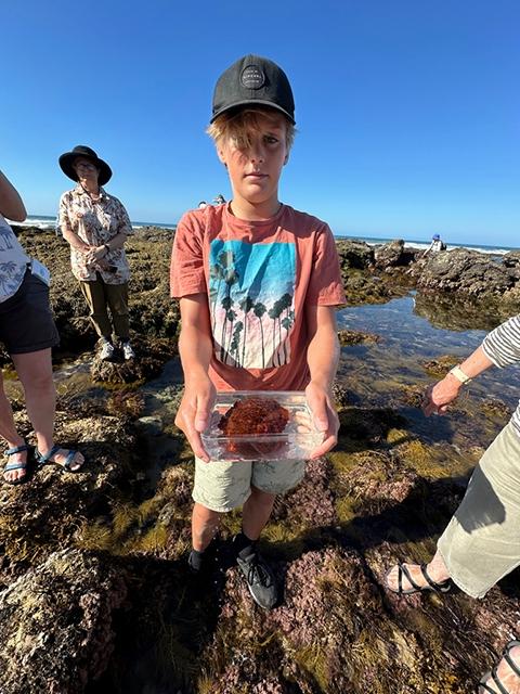 Hugh shows a Wandering Sea Anemone that is covered with bubble-like sacks